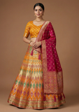 Mustard Yellow & Rani Pink Festive Lehenga Choli with Zari Weaving