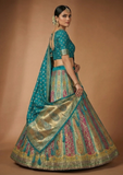 Teal Green Designer Lehenga Choli with Multi-Color Weaving & Zari Work