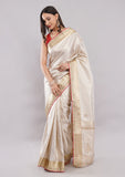 Cream Self Design Silk Saree with Golden Stone Work Border